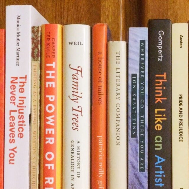 shelf of mostly orange books